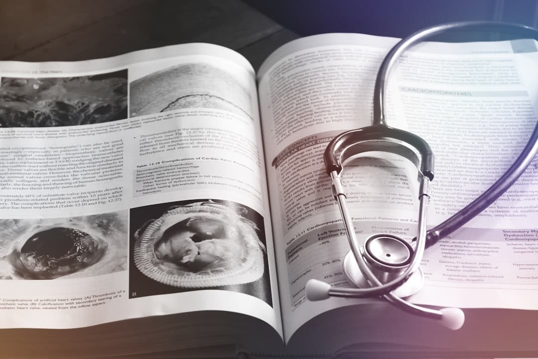 An open medical book with a stethoscope