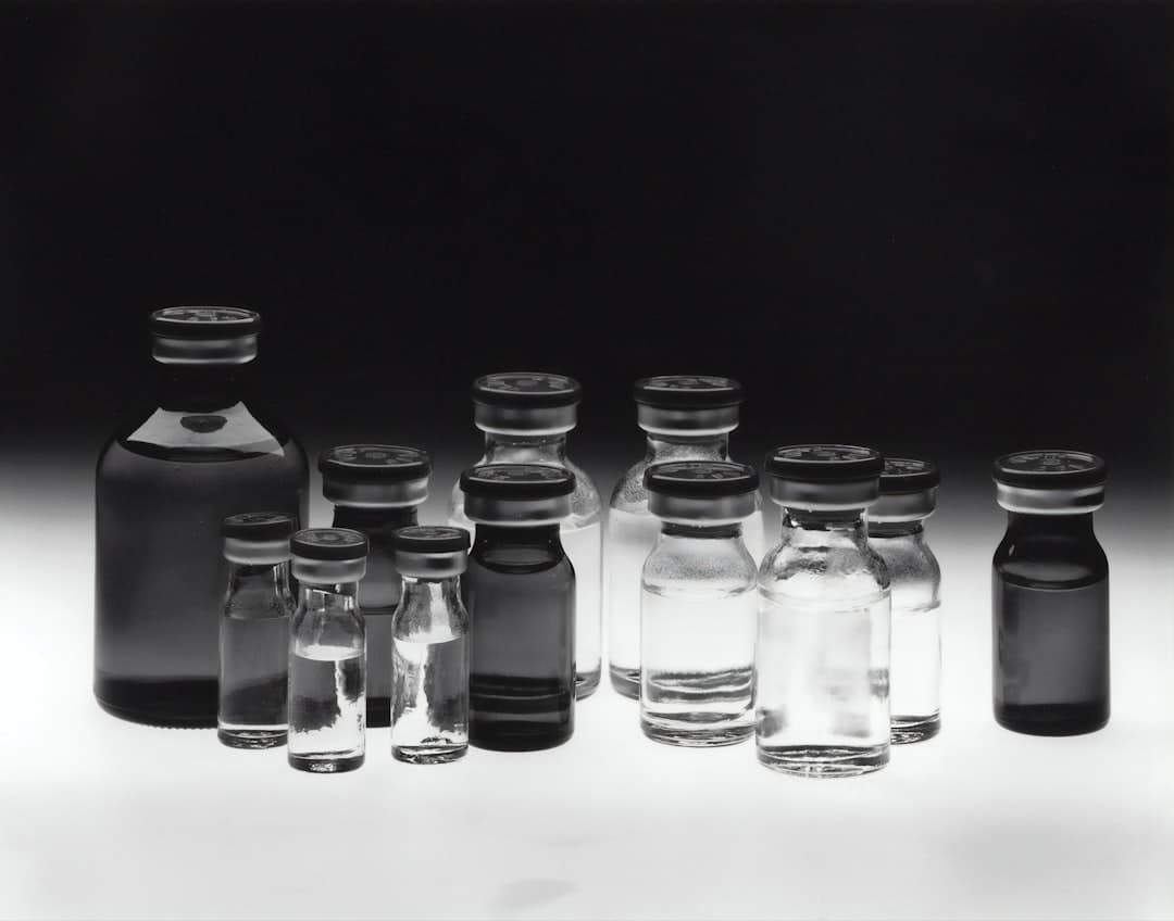 Grayscale photo of laboratory glass tubes